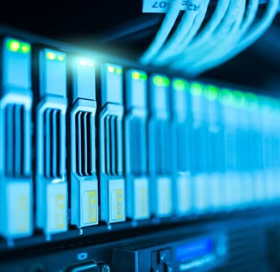 Detailed image of a server rack with glowing lights in a modern data center.