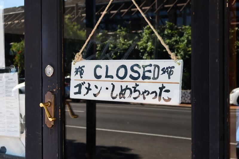 white and black wooden signage